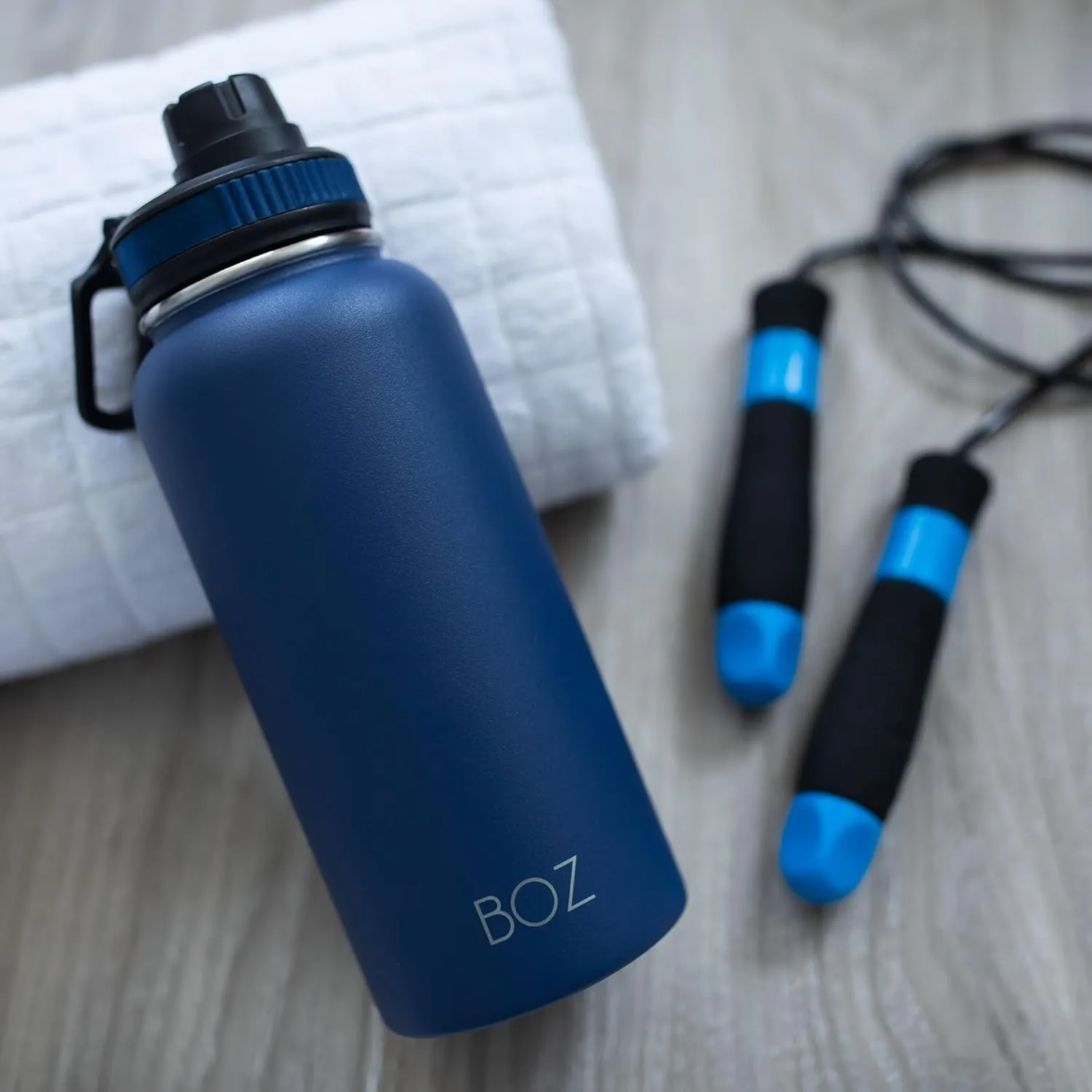 BOZ Stainless Steel Water Bottles 2 Pack Bundle - Blue Water Bottle   Black Water Bottle - Vaccum Insulated Water Bottles 32 Oz - Wide Mouth BPA Free Sport Water Bottles for Gym with Spout Lid