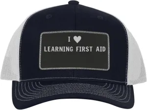 I Heart Love Learning First Aid - Leather Black Patch Engraved Trucker Hat