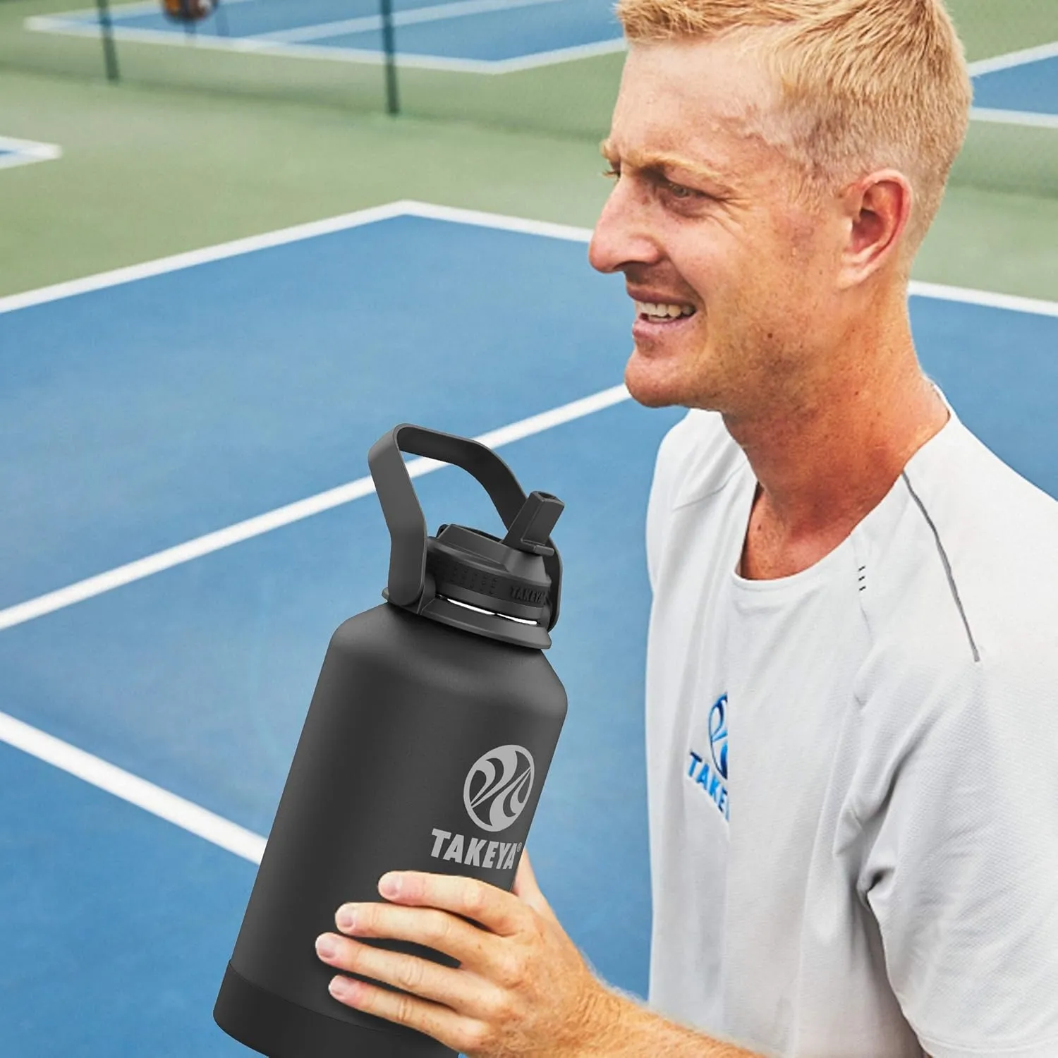 Takeya Pickleball Stainless Steel Insulated Water Bottle with Choice of Lid and Carry Handle, 64 Ounce, Rally Blue