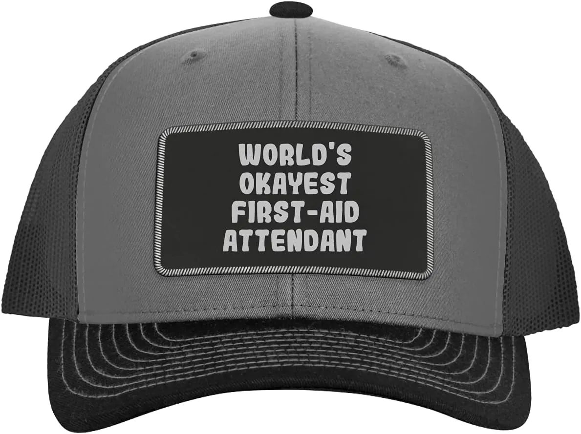 World's Okayest First-Aid Attendant - Leather Black Patch Engraved Trucker Hat