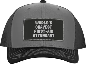 World's Okayest First-Aid Attendant - Leather Black Patch Engraved Trucker Hat